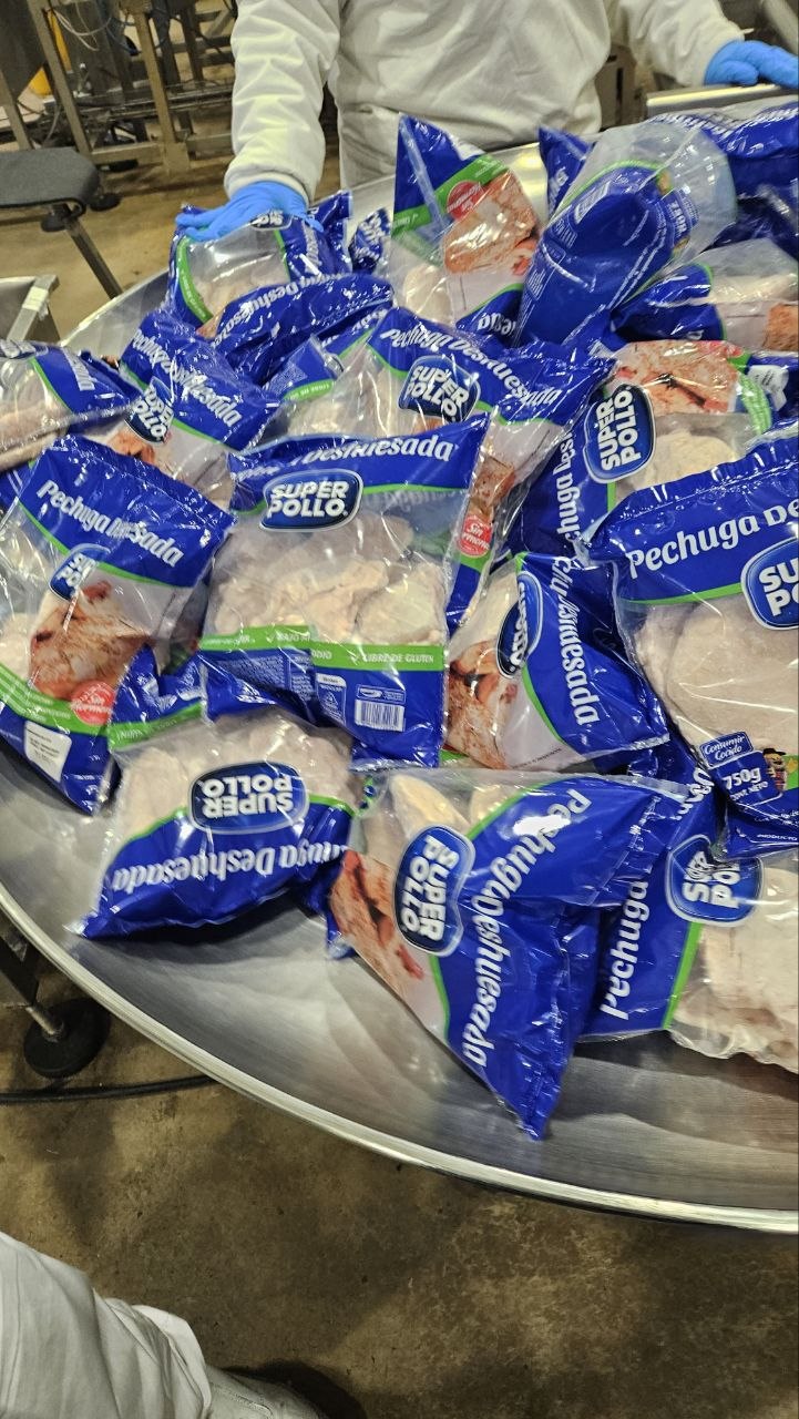 Super Pollo frozen boneless chicken breast bags staged during production