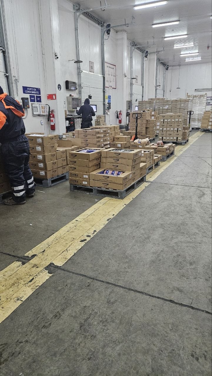 Wide shot of cold storage staging and loading area